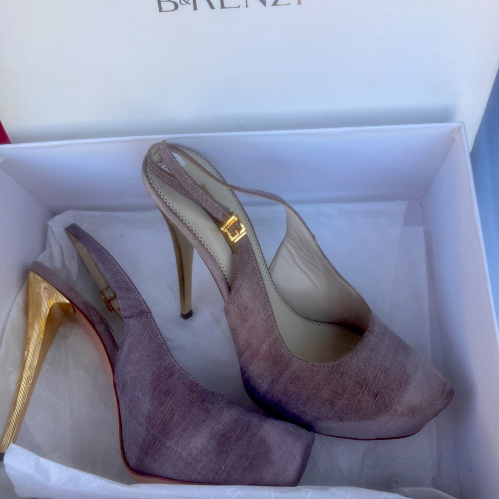 Brand new in box. Sexy pumps. Italian leather. Open to offers.